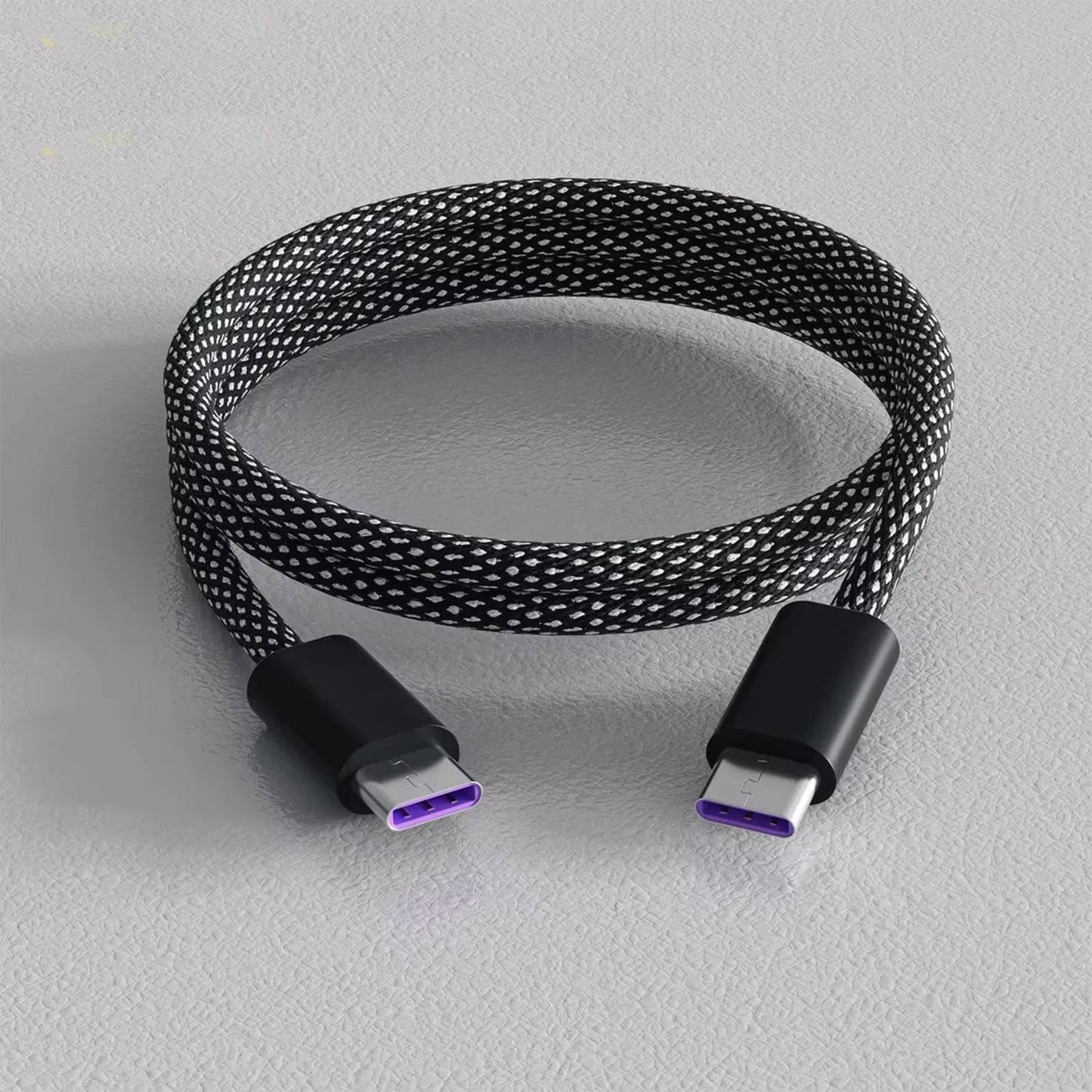 Self-Coiling Magnetic Charging Cable with Braided Protection and Interchangeable Tips