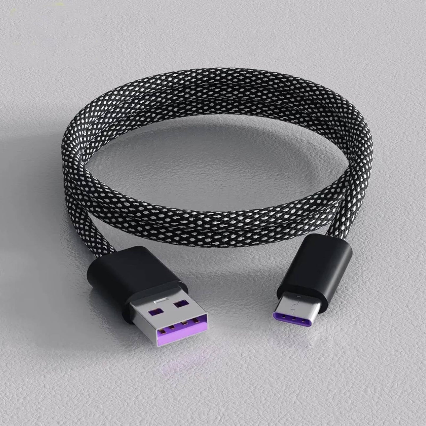 Self-Coiling Magnetic Charging Cable with Braided Protection and Interchangeable Tips