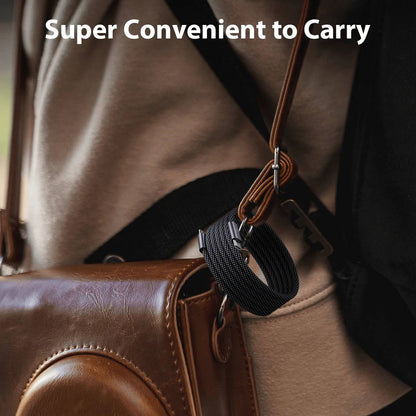 Self-Coiling Magnetic Charging Cable with Braided Protection and Interchangeable Tips